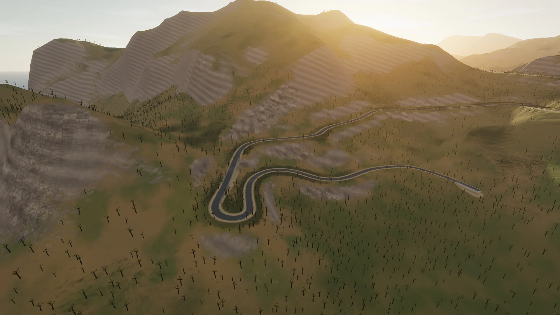 In-game aerial view of the winding mountain road above Cala Tuent in golden-hour light