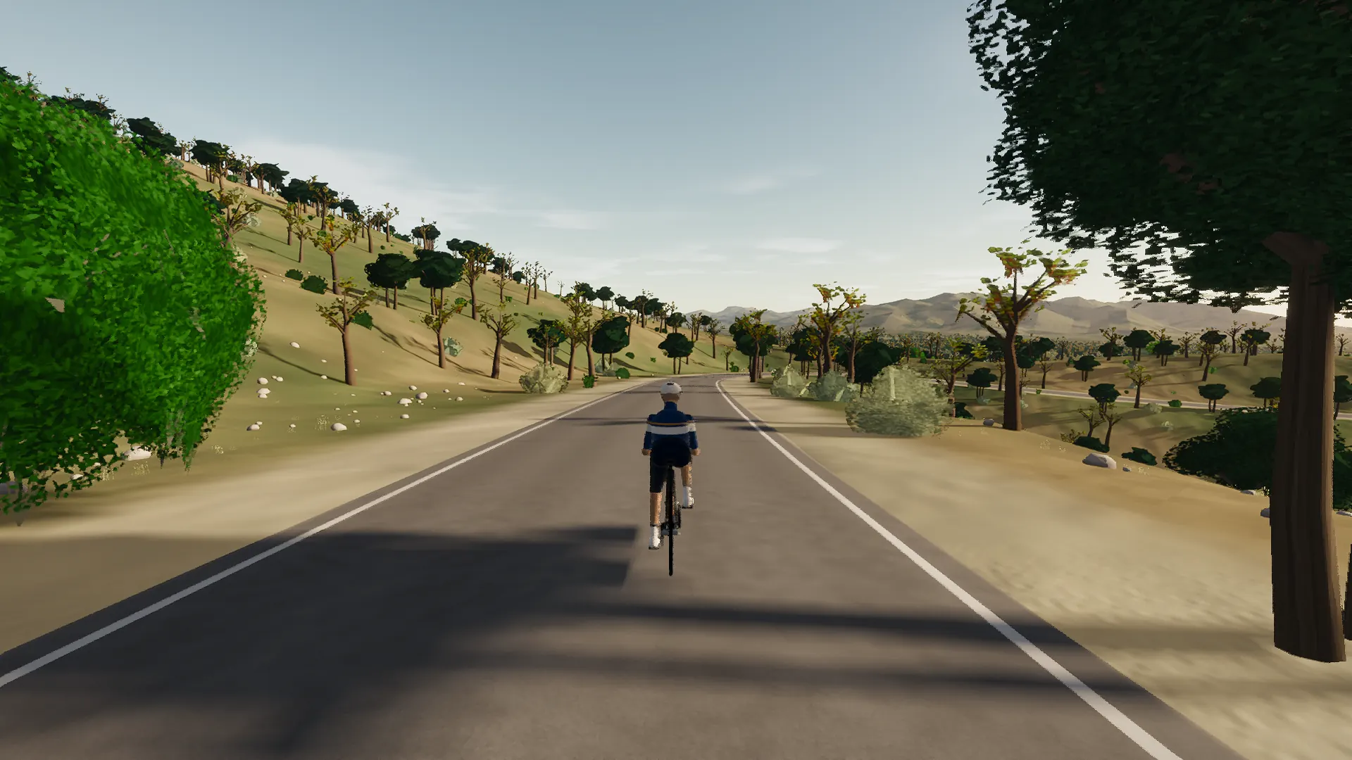 In-game view captured on The coll des Vidrier loop, a cycling route in Llevant & East Coast